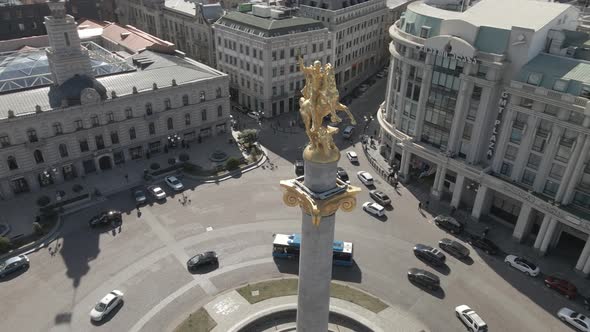 Flying over column of freedom in the center of Tbilisi, Georgia