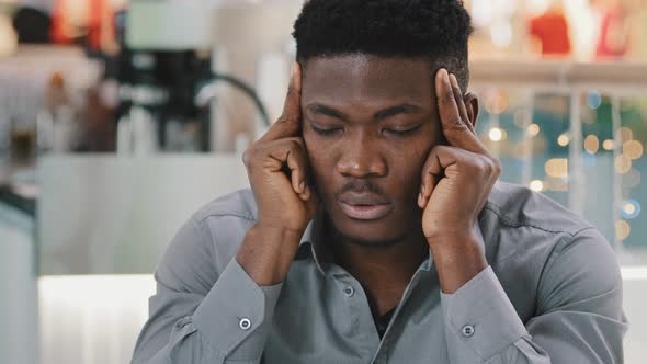 Closeup Sad Unhealthy African American Man Rubbing Temples Feels Severe Headache Pressure Suffering