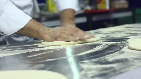 Chef Prepares Italian Pizza Dough