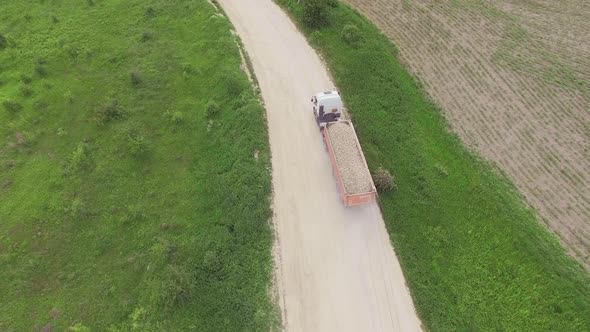 Aerial view of a truck with ballast driving