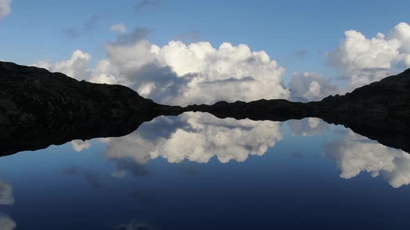 Clouds Reflection On The Lake