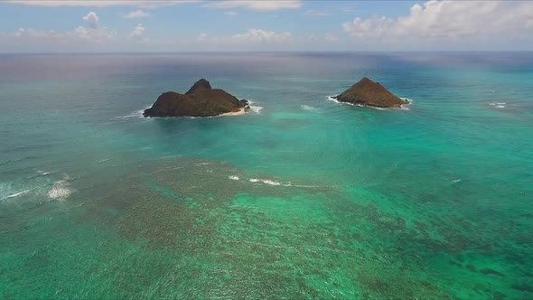 Aerial view of Mokulua Islets Seabird Sanctuary on a calm sunny day