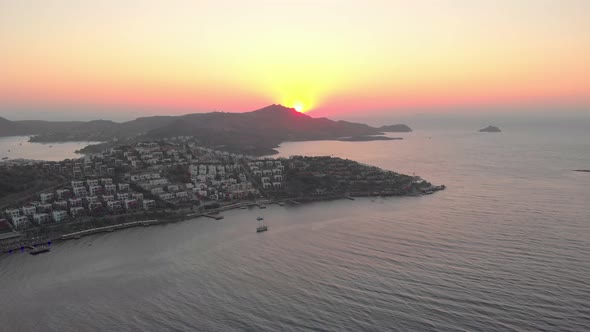 Sunset Over Mountains And Sea