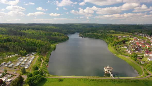 Movie of drone flight over Twiste lake and dam in the German area of Northern Hesse during daytime