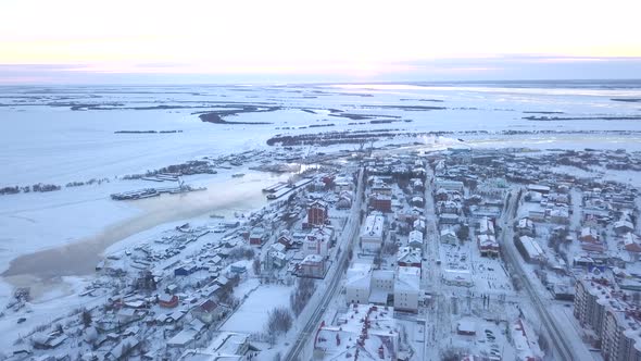 Top View of Town on Background of Fields in Winter