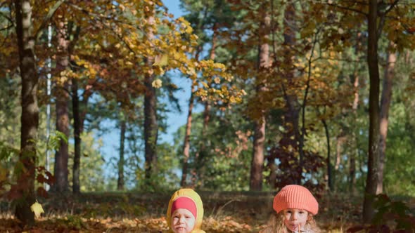 Authentic Little Cute Caucasian Preschool Siblings Children Girl and Boy Eating on Plaid in Fallen