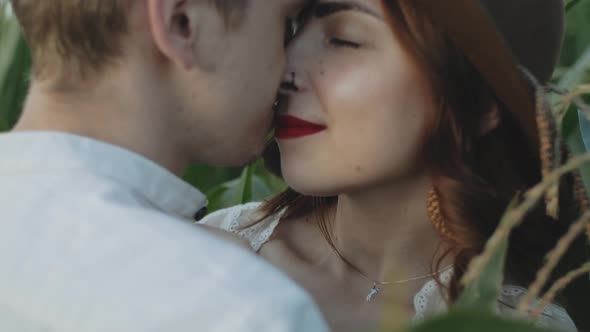 Attractive Couple in the Corn Field