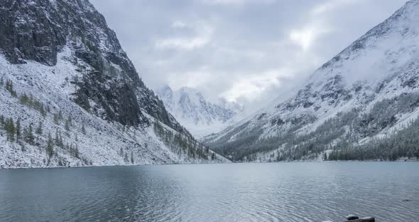 Snow Mountain Lake Timelapse at the Autumn Time. Wild Nature and Rural Mount Valley. Green Forest of
