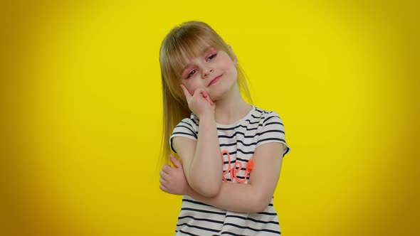 Thoughtful Clever Little Teen Child Kid Girl Rubbing His Chin Pondering a Solution Doubting Question