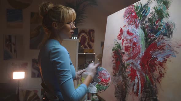 Talented Female Artist Working on a Modern Abstract Oil Painting Uses Splattering and Dripping with