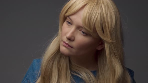 Nordic Blond Model in Studio with Dramatic Top Light