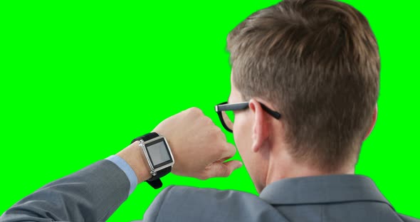 Businessman using smartwatch