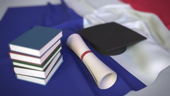 Graduation Cap and Diploma on the French Flag alt