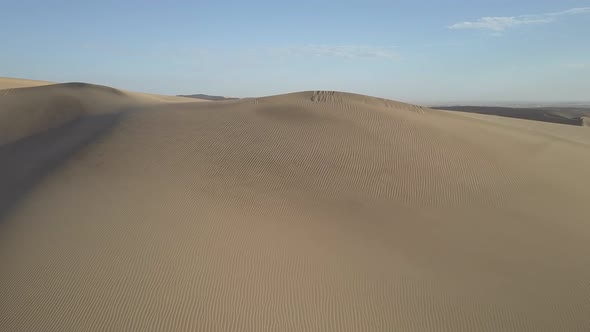 Aerial drone view of sand dunes sanddunes safari in Africa desert.