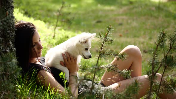 Dog and Woman in Nature