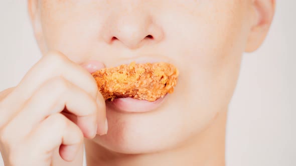 Portrait Female Eats Fried Meat