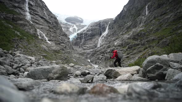 Backpacker on the Kjenndal Glacier Trail