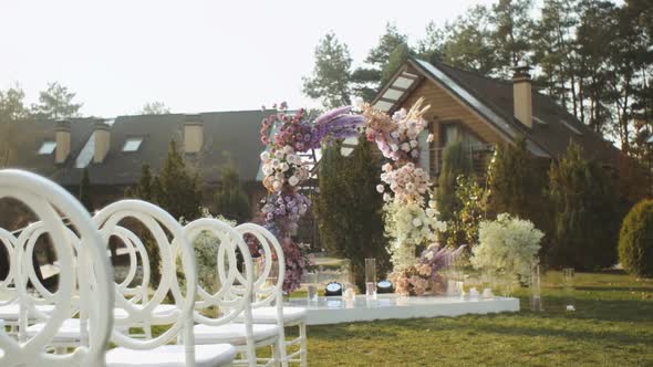 View of Wedding Floral Decorations of Flowers in Pastel Faded Colors Slow Motion Outside Wedding