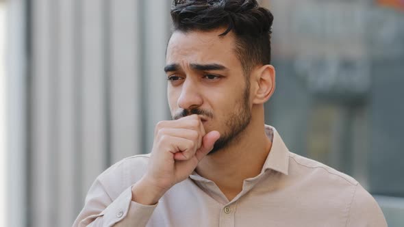 Portrait of Unhappy Indian Sick Guy Coughing Suffers Symptoms of Covid19