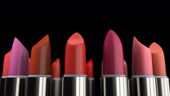 Colorful Lipsticks with Red Tint on the Makeup Fashion Cosmetic Presentation 4k