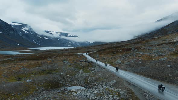 Scenic Aerial Shot of Touring Motorcyclist Group