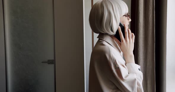 Smiling Young Business Woman Professional Talking on Phone Sit at Home