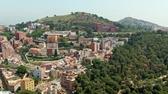 Beautiful living district on hillside in Spain, aerial view