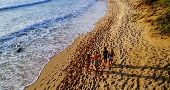 Tourists walking at beach