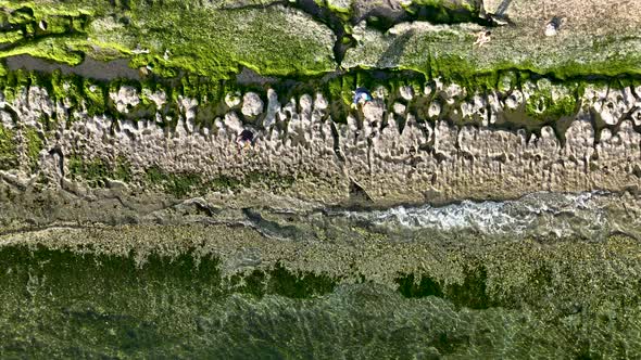 Texture of the rocky beach aerial view 4 K Turkey Alanya
