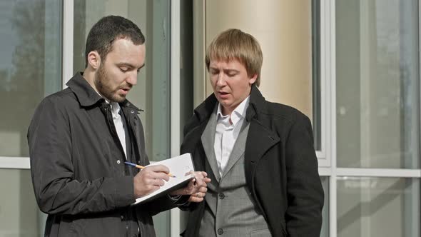 Two Businessmen Talking Outdoor