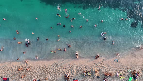 People swim in the azure sea aerial view 4 K Turkey Alanya