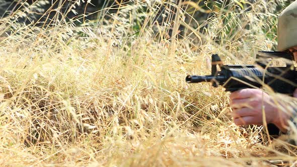 Military soldier during training exercise with weapon