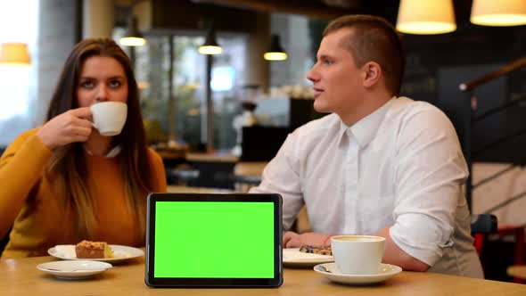 Tablet Green Screen, Happy Couple Talk, Eat and Drink in Cafe, Coffee and Cake