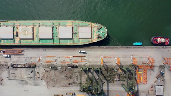 Container cargo freight ship at landmark Santos harbor.