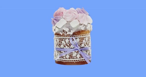 Easter Cake, Decorated With Icing And Colorful Meringues, Wrapped In A Sweet Edible Ribbon