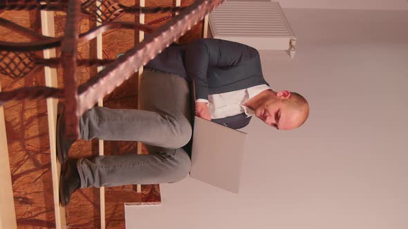 Overworked Business Man Smoking Sitting on Stairs