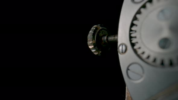 Antique Pocket Watch Mechanism Moving on Isolated Black Studio Background