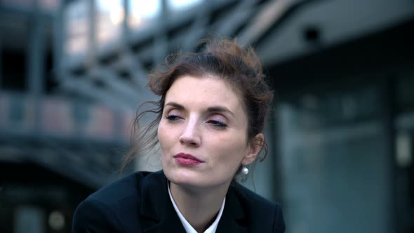 thoughtful sophisticated business woman - outdoor