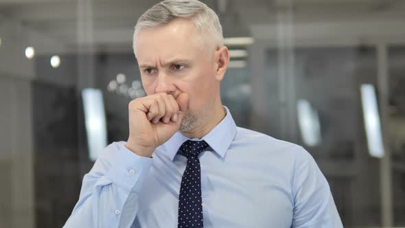 Cough Portrait of Sick Grey Hair Businessman Coughing at Work