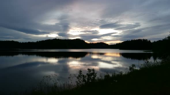 Clouds in the Sky Over a Body of Water