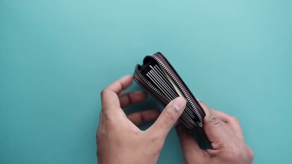 Man Hand Taking Credit Card Out From a Wallet