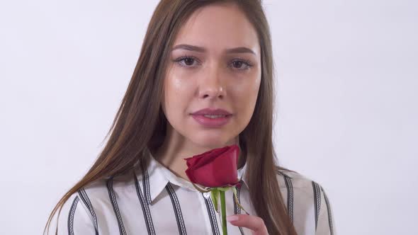 Portrait of Sad Young Woman, Crying in Studio