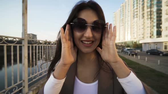 Beautiful Brunette Businesswoman In Business Clothes Walks In The City