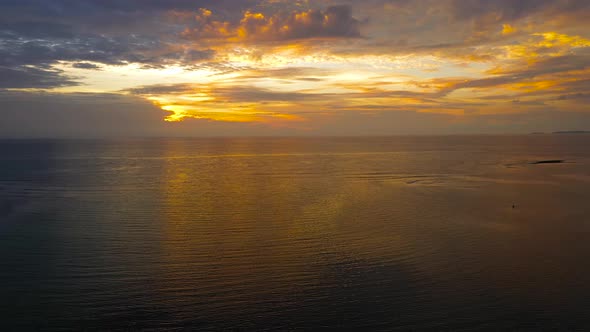 Cloudy Sky Over the Sea During Sunrise