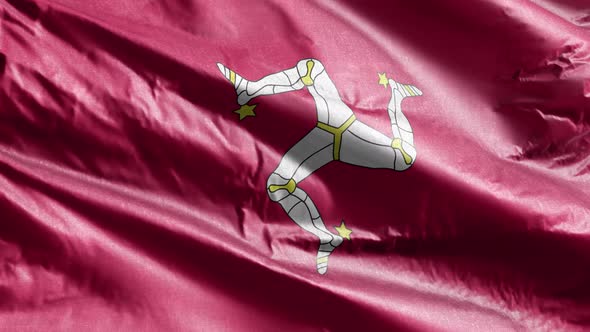 Isle of Man textile flag waving on the wind. Slow motion. 20 seconds loop.