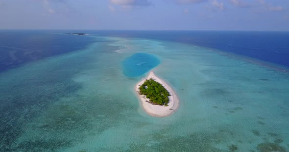 Daytime above abstract shot of a white sand paradise beach and turquoise sea background 