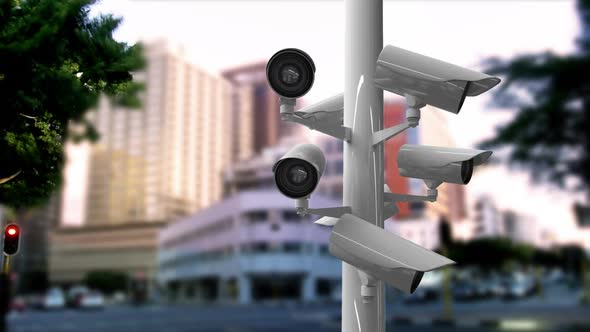 Surveillance cameras in a busy street