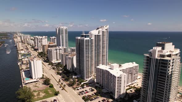 Slow aerial Hollywood Beach Florida. 5k clip of beachfront condominiums and resorts