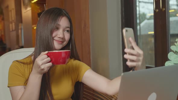 Beautiful Young Asian Woman Selfie With Coffee Cup 