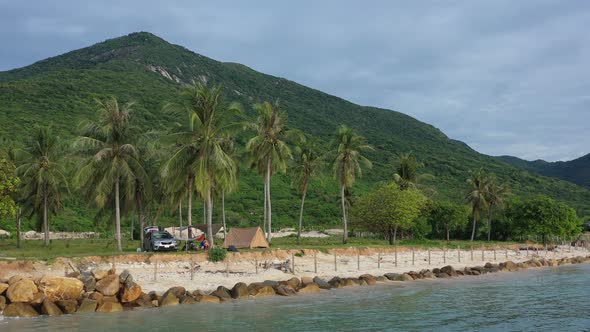 Tent and car on the sea shore